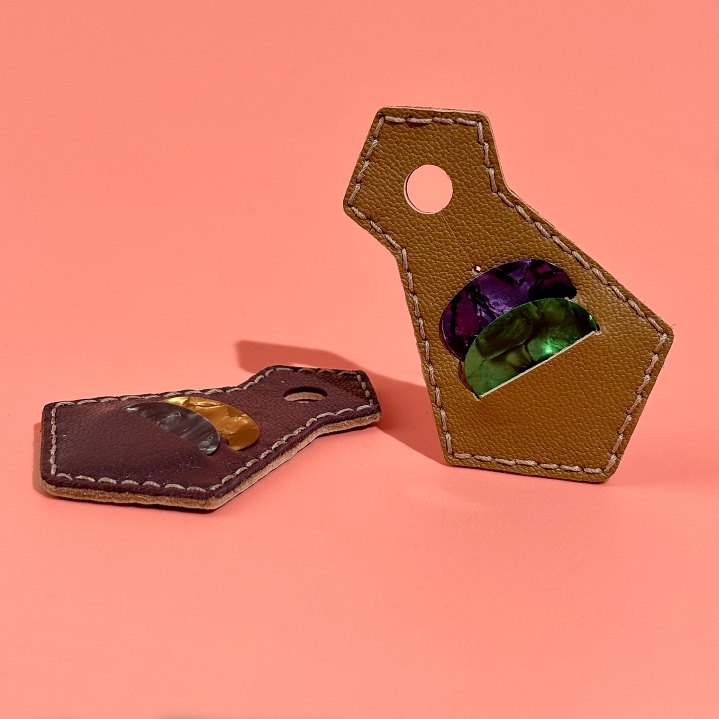 Brown handmade sheepskin leather guitar pick holder in tie shape with pick