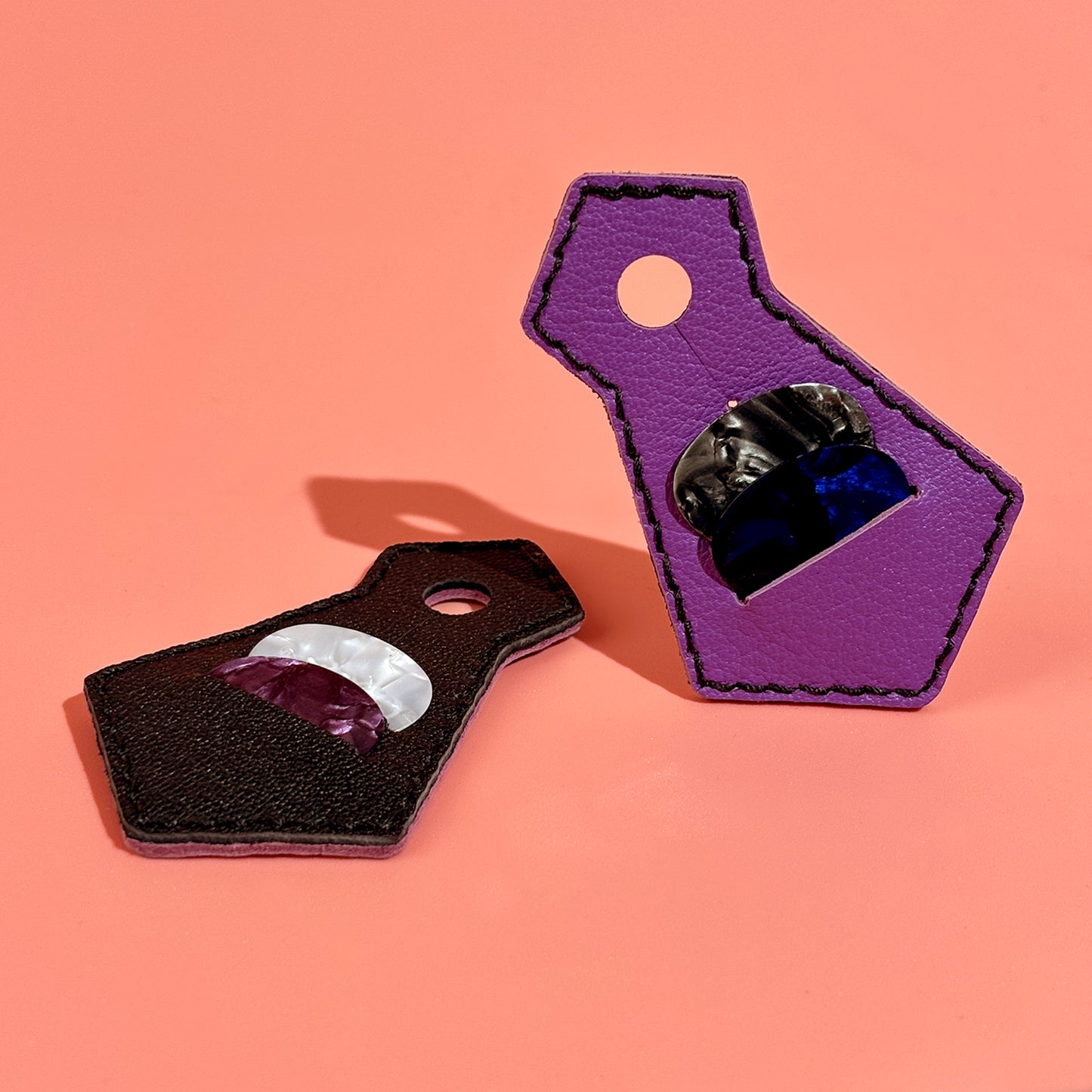 Purple handmade sheepskin leather guitar pick holder in tie shape with pick