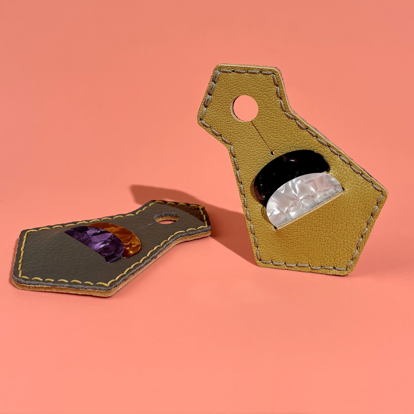 Yellow handmade sheepskin leather guitar pick holder in tie shape with pick