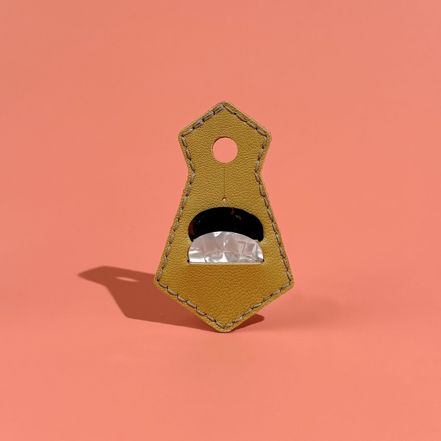 Yellow unique tie-shaped leather guitar pick pouch with pick