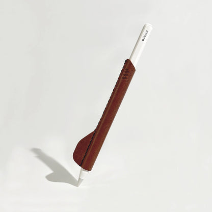 Handcrafted brown leather cover for Apple Pencil, featuring an ergonomic design that improves handling and reduces hand fatigue.