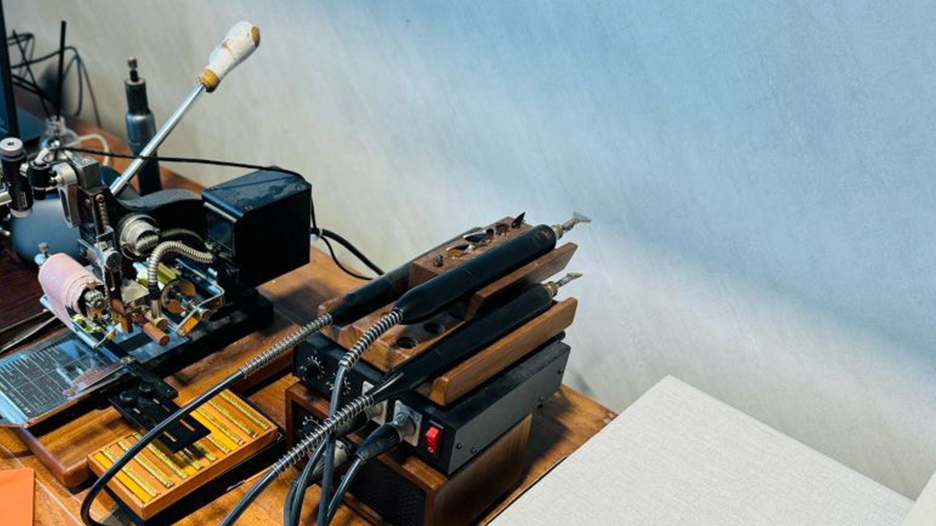 A corner of a studio, showcasing handcrafted tools and equipment.
