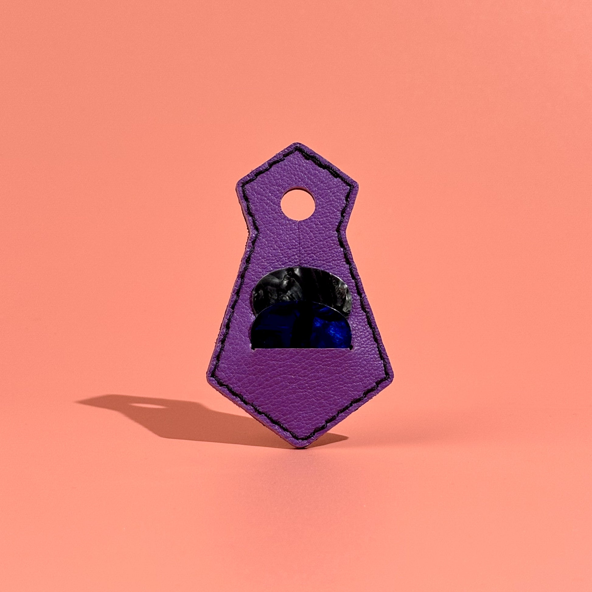 Purple unique tie-shaped leather guitar pick pouch with pick
