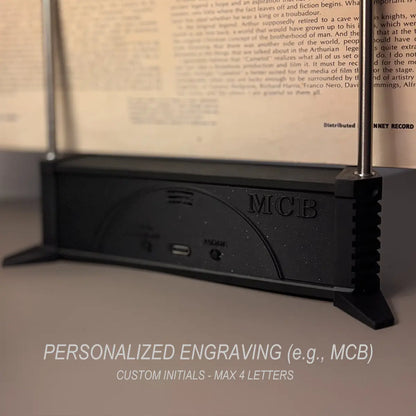 Back view of LLKworks Now Playing Vinyl Record Stand with VU Meter & RGB, showcasing personalized engraving with custom initials "MCB" (max 4 letters), USB-C power port, and 3D printed design details.