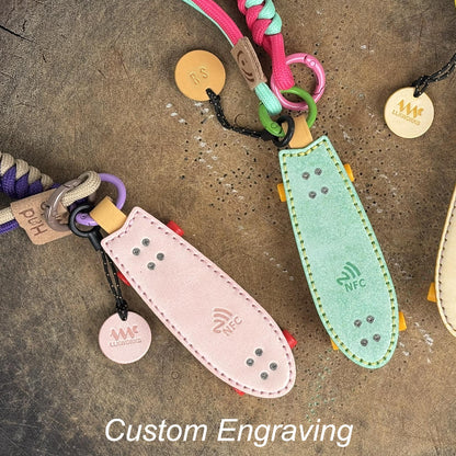Personalized skateboard keychain with custom engraved leather tag, perfect gift for skaters.
